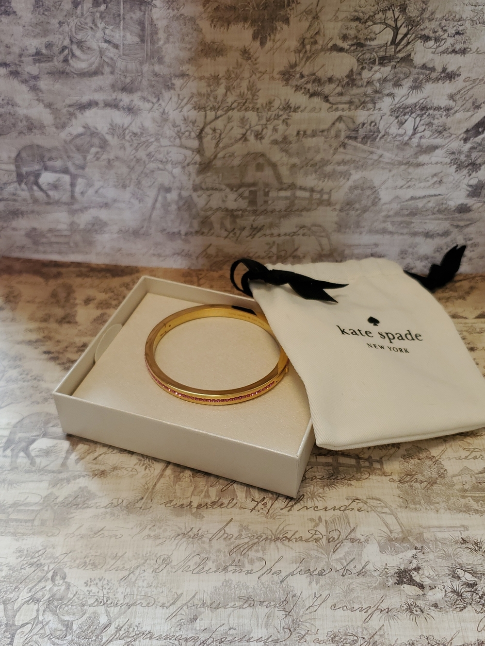 kate spade Gold Bangle Bracelet with Pink Accent